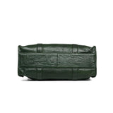 Bottom view of a green leather Boston bag with visible stitching and textured finish