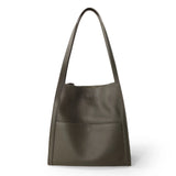 Minimalist grain cowhide leather tote bag with long handles, dark grey, on white background