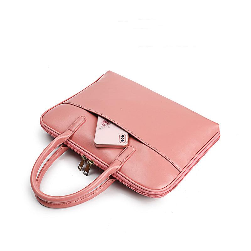 Pink leather slim laptop briefcase for women with front pocket and dual handles.
