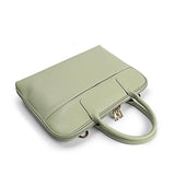 Slim light green leather laptop briefcase with dual handles and gold zipper, 14 inch office bag