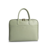 Pastel green leather laptop bag for women with dual handles and front pocket, office style