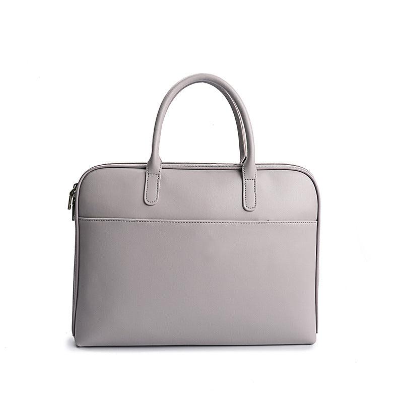 Slim grey leather laptop briefcase for women with top handles, front pocket, minimalist design