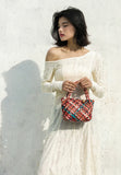 Luxury Handwoven Lambskin Leather Shoulder Bucket Bag with Sculptural Gold Sphere Closure and Double Handle Design – Spacious & Versatile Carryall