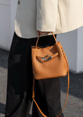 Luxury Pebbled Cowhide Leather Bucket Bag, Designer Crossbody with Twist Lock