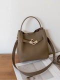 Luxury Pebbled Cowhide Leather Bucket Bag, Designer Crossbody with Twist Lock