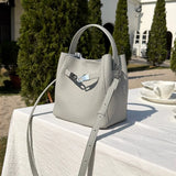 Luxury Pebbled Cowhide Leather Bucket Bag, Designer Crossbody with Twist Lock