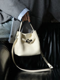Luxury Pebbled Cowhide Leather Bucket Bag, Designer Crossbody with Twist Lock