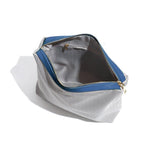 Gray fabric pouch with blue leather trim, gold zipper, and interior pocket, open view