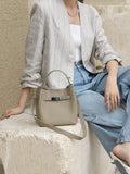 Luxury Pebbled Cowhide Leather Bucket Bag, Designer Crossbody with Twist Lock