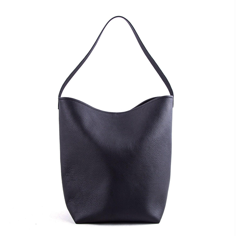 Minimalist black leather bucket bag with single shoulder strap on white background