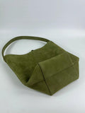Minimalist olive green leather bucket bag with wide strap and spacious design on white background