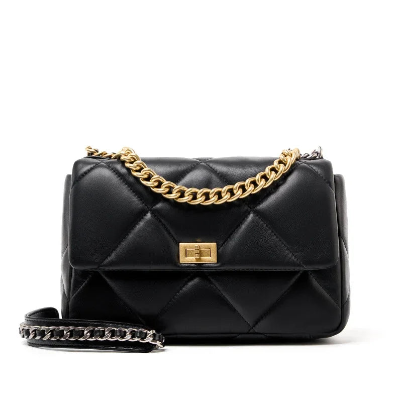 Black quilted genuine leather shoulder bag with gold chain strap and lock clasp