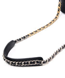 Leather shoulder bag strap with gold and silver chain on white background