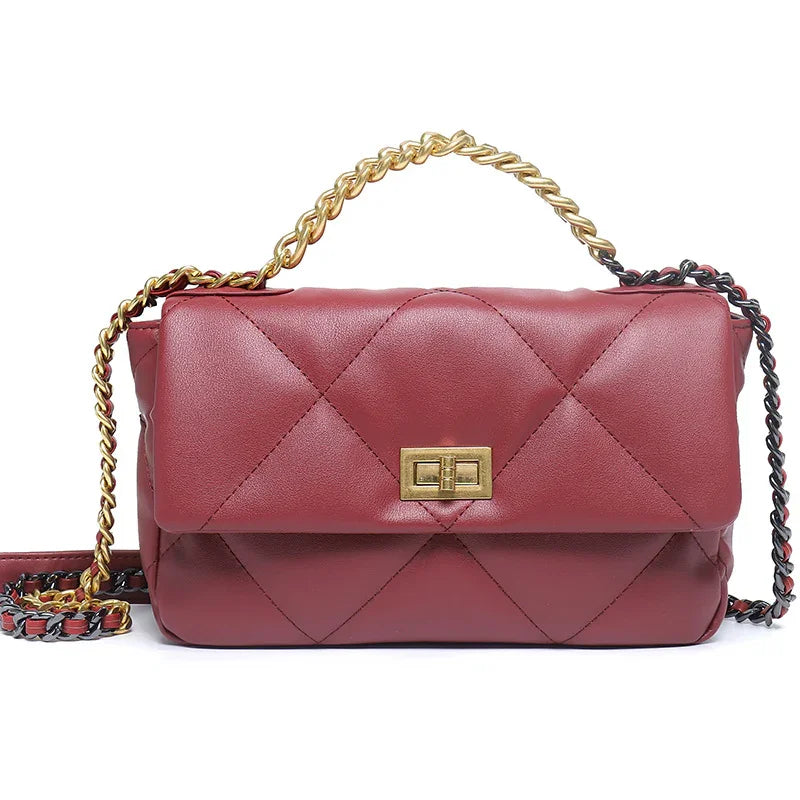 Quilted lambskin leather shoulder bag in burgundy with gold chain strap and turn-lock closure