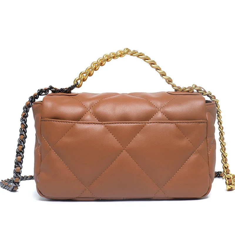 Brown quilted leather shoulder bag with gold and black chain strap on white background