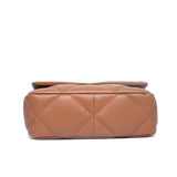 Tan quilted genuine leather flap bag with diamond stitching, shown from the bottom view