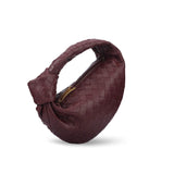 Small burgundy lambskin leather handbag with knotted handle and woven intrecciato design