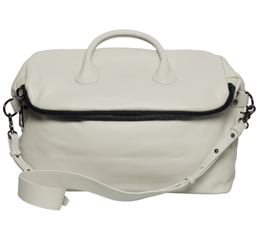 White leather duffle bag with top handles, adjustable shoulder strap, and zip closure