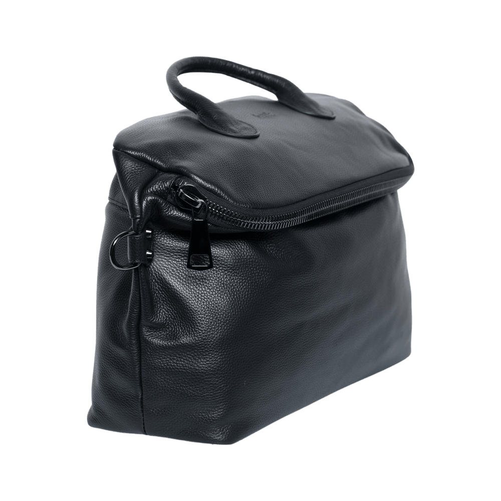 Black leather travel bag with zipper, pebbled texture, and dual handles on white background