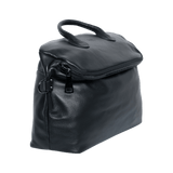 Black leather travel bag with zipper, pebbled texture, and dual handles on white background