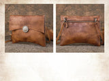 Handcrafted brown leather clutch bag with silver button accent and removable shoulder strap
