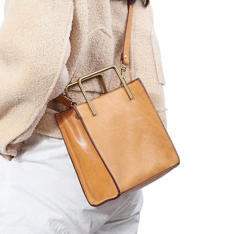 Genuine cowhide leather shoulder bag with gold handles, stylish handmade handbag for women
