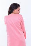 Woman wearing light pink jacquard maxi kaftan with subtle swirl pattern, back view