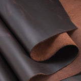 Close-up of premium dark brown genuine leather material for handbags and tote bags