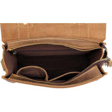 Interior view of a handcrafted brown leather shoulder bag with multiple compartments and zipper pocket