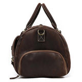 Dark brown full grain leather duffle bag with front zip pocket and dual handles