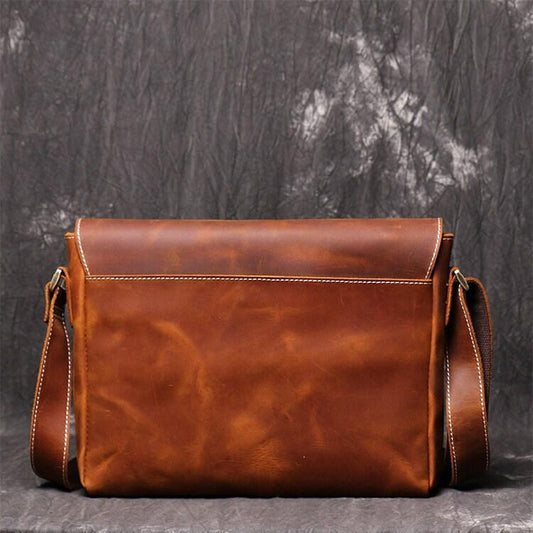 Handmade retro cowhide leather shoulder bag with flap closure and adjustable strap