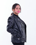 Woman modeling black genuine leather biker jacket with zip details on white background