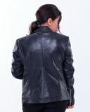Woman wearing slim fit black genuine leather biker jacket, rear view