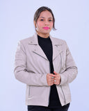 Woman wearing slim fit grey genuine leather biker jacket with zipper details