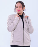 Woman wearing slim fit genuine leather biker jacket in light grey with zip details