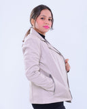 Woman wearing slim fit grey genuine leather biker jacket with zip pockets