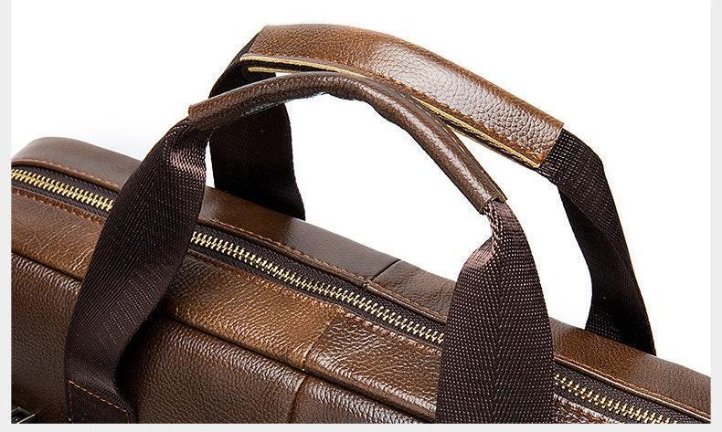 Brown leather laptop shoulder bag with top handles and gold zipper detail