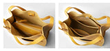 Interior view of yellow grain cowhide leather tote bag with zippered compartment and pockets