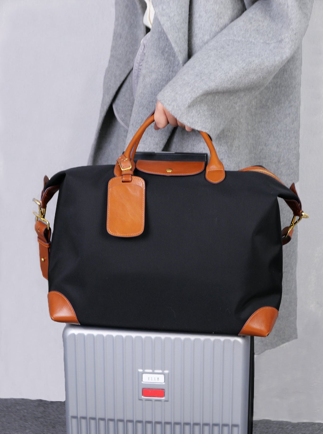 Handmade nylon cowhide tote bag interior organisation – zip pocket and laptop compartment