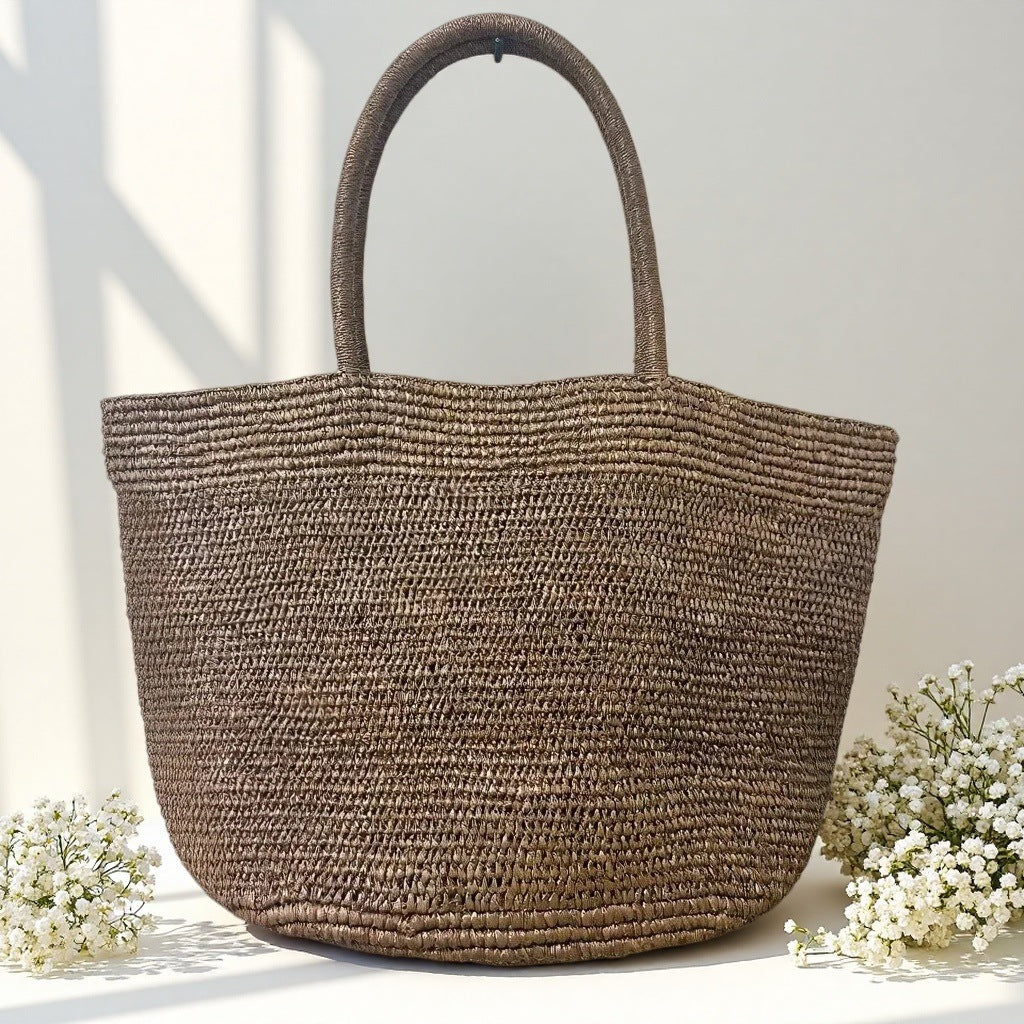 Handwoven raffia beach tote in chestnut brown – large natural straw summer tote women