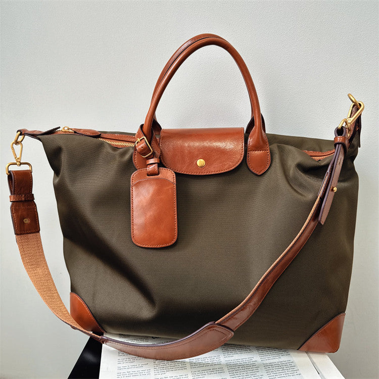 Full interior of handmade recycled nylon cowhide tote – laptop slip and zip pocket