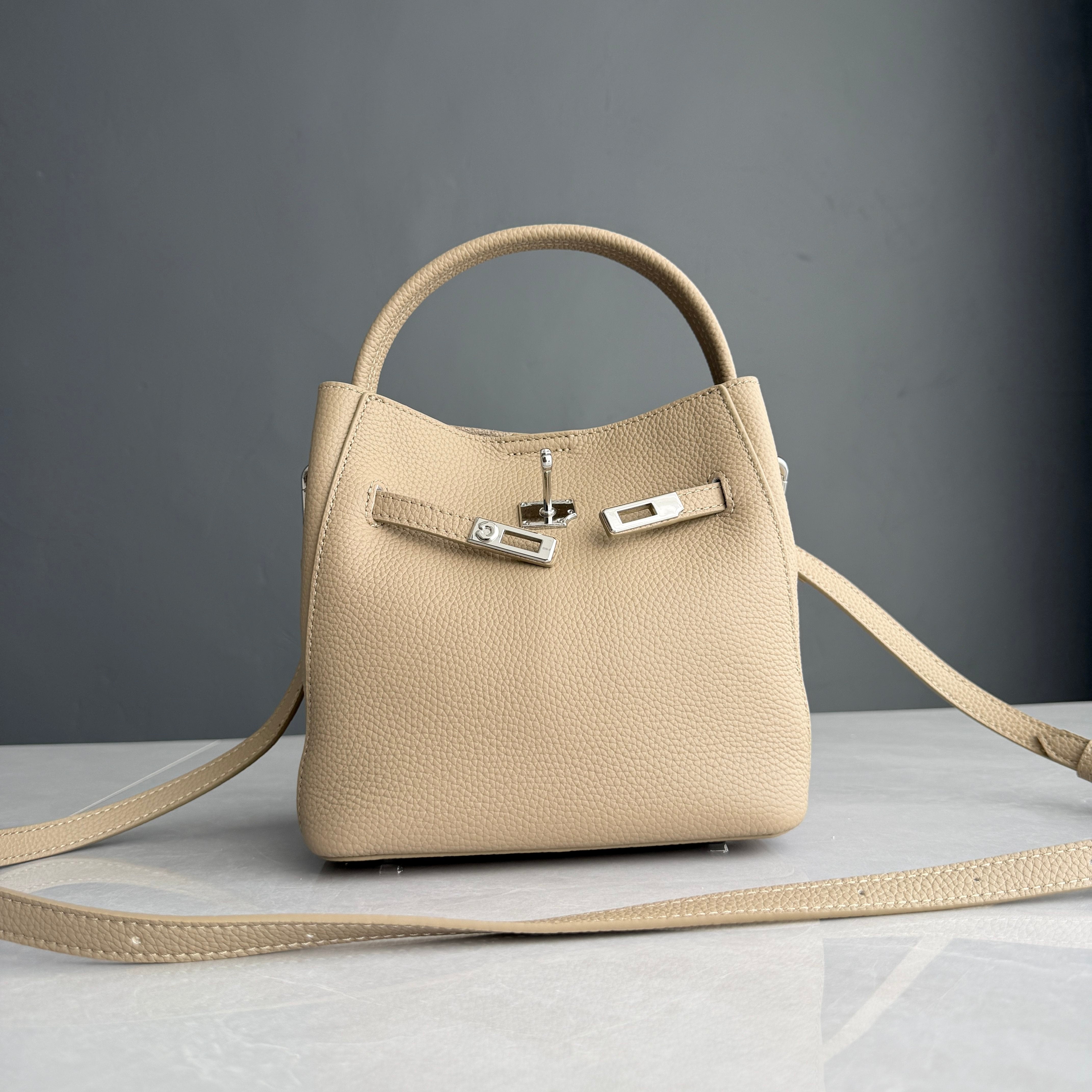 Luxury Pebbled Cowhide Leather Bucket Bag, Designer Crossbody with Twist Lock