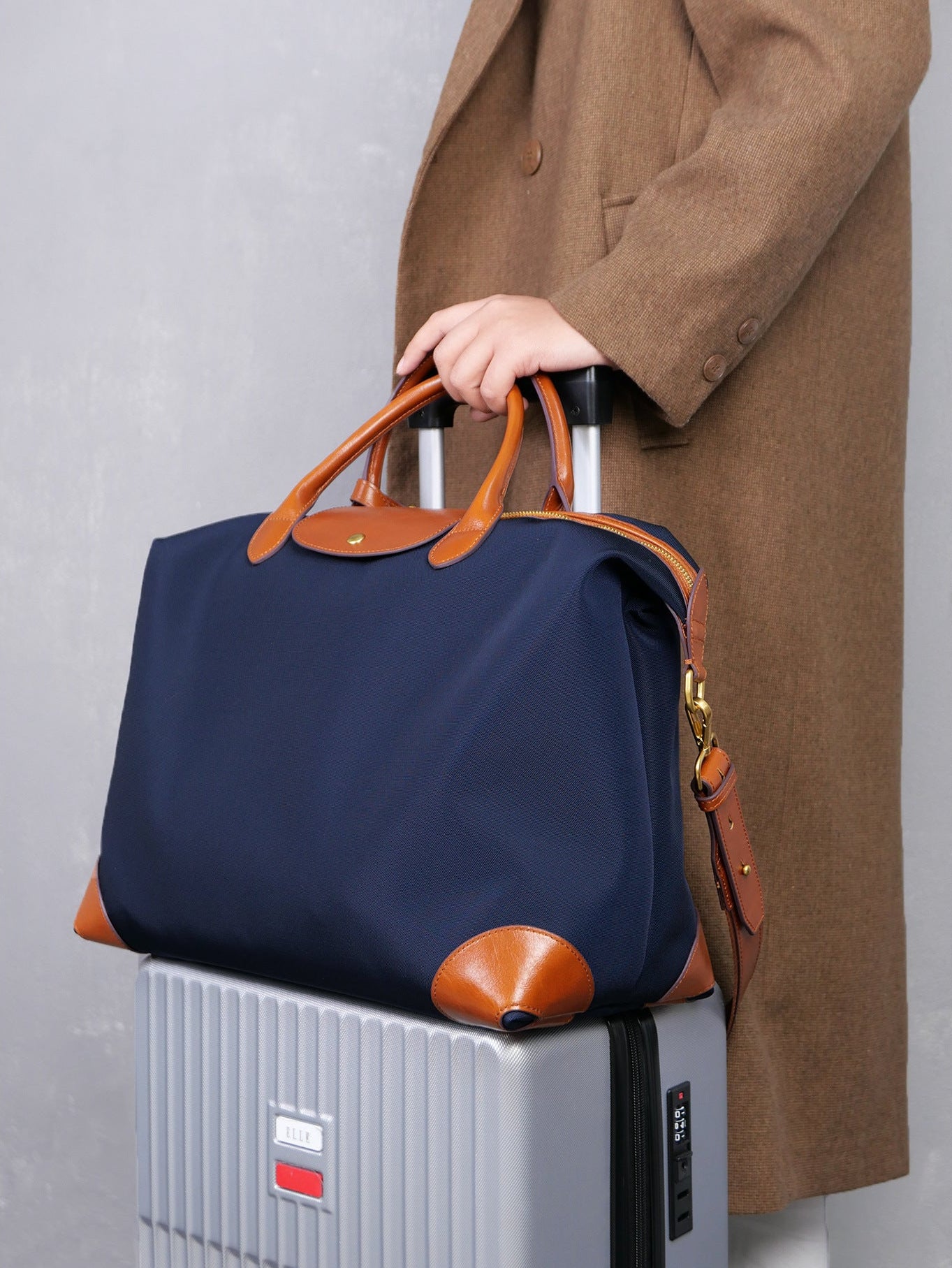 Interior of recycled nylon cowhide tote showing laptop slip and zip pocket – work commuter bag