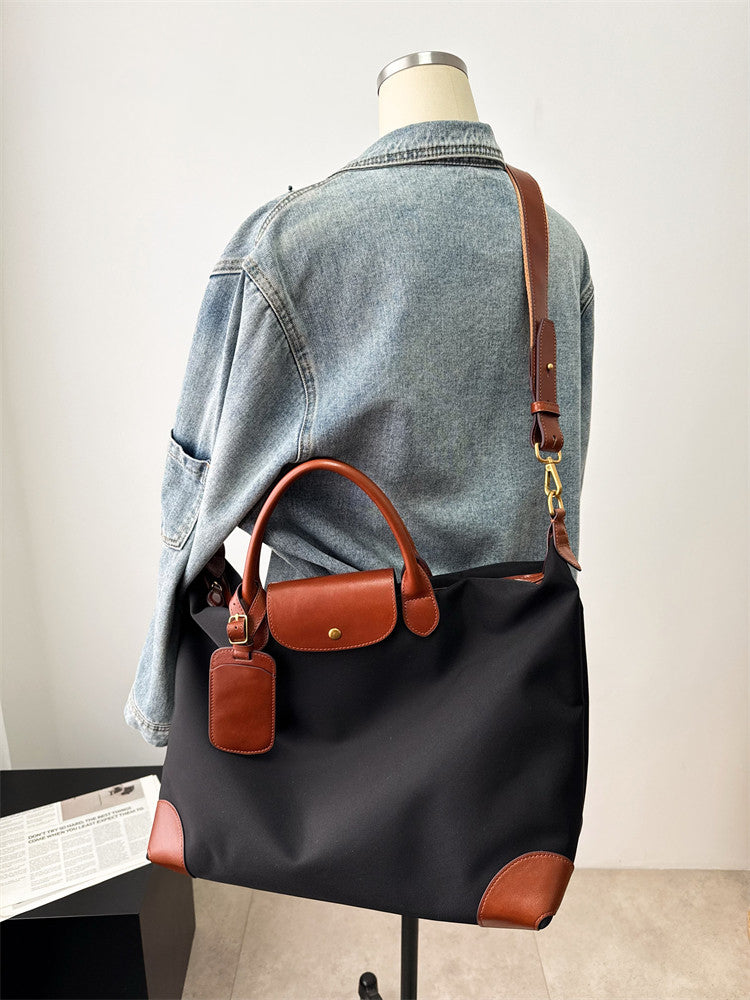 Handmade nylon tote – cowhide leather trim and zip closure detail