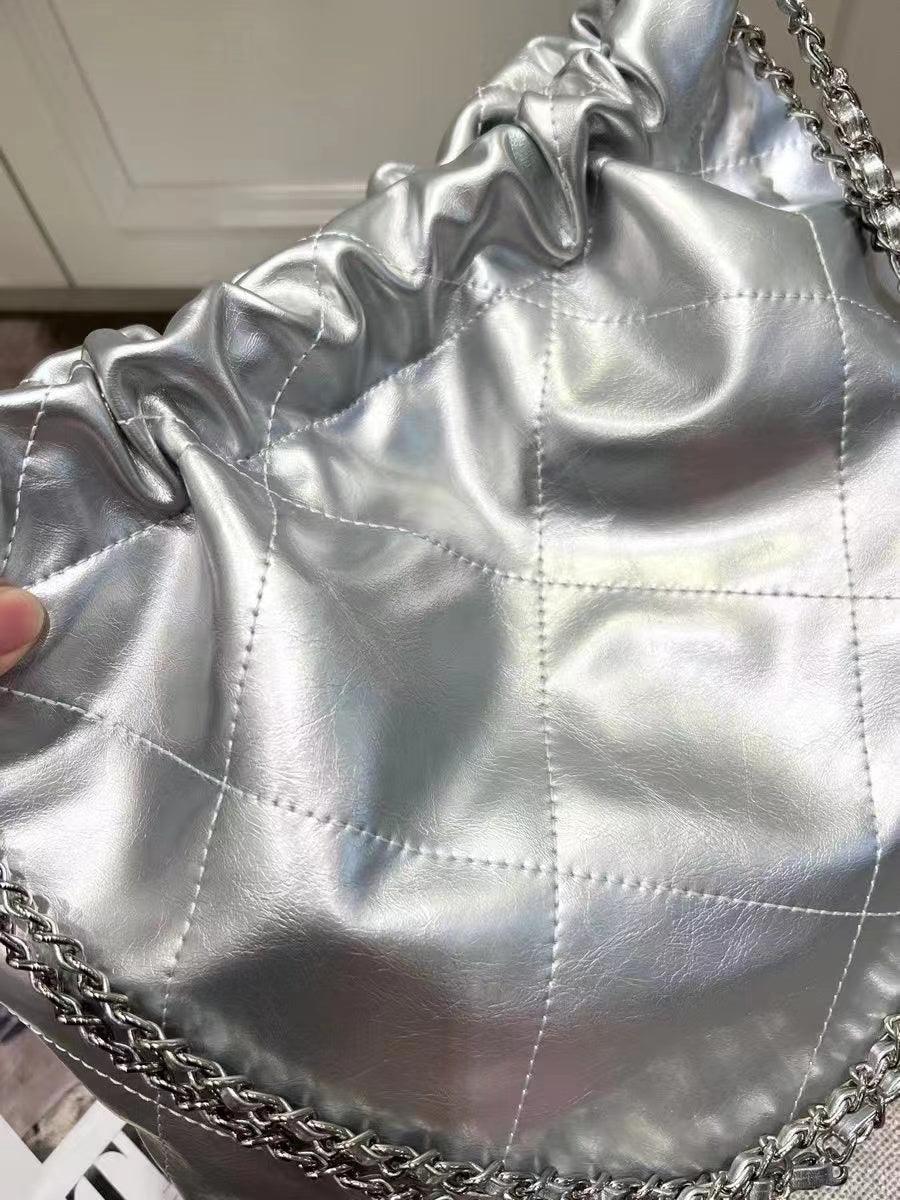 Large silver quilted leather shoulder bag with chunky chain strap and ruched detailing