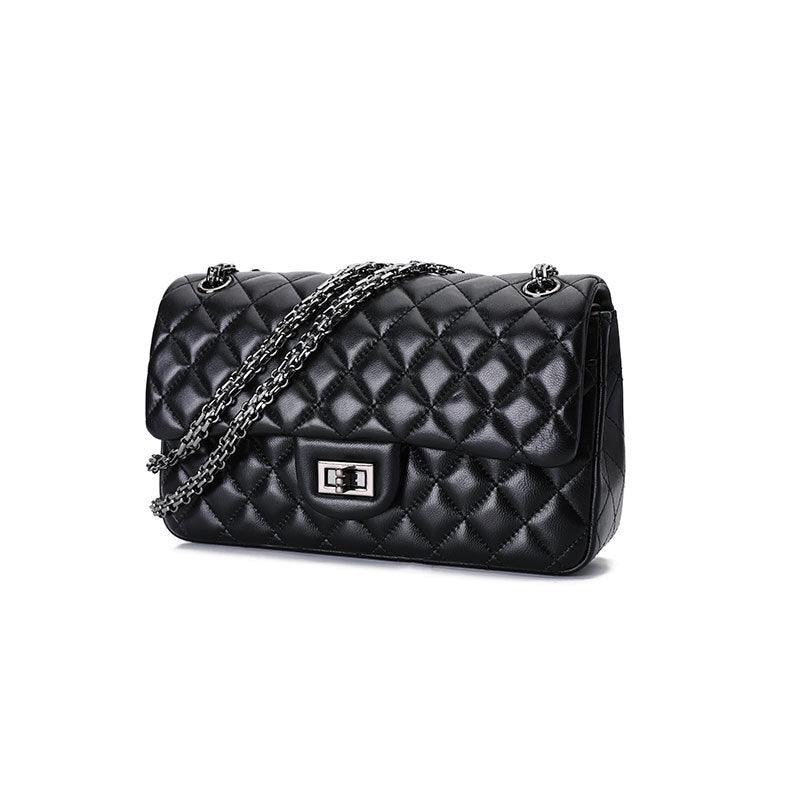 Black quilted genuine leather shoulder bag with chain strap and metal clasp, minimalist crossbody