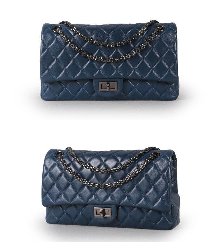 Quilted black genuine leather shoulder bag with chain strap and turn-lock closure, minimalist design