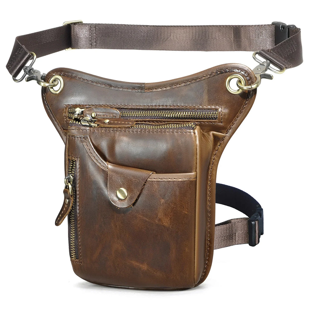 Full grain dark brown leather leg bag with zipper pockets and metal rivet details