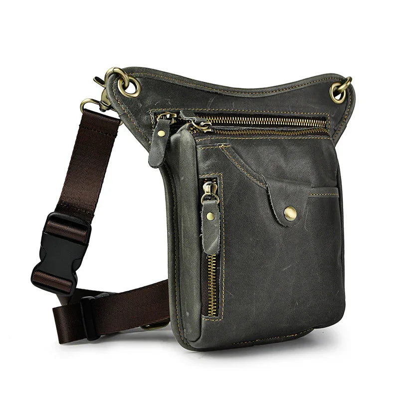 Full grain leather leg bag with zippered pockets and brass snap closures, motorcycle waist pouch dark grey