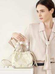 Grace Resin Handle Crossbody Beaded Bucket Bag | Leather Clutch with Floral Pleats
